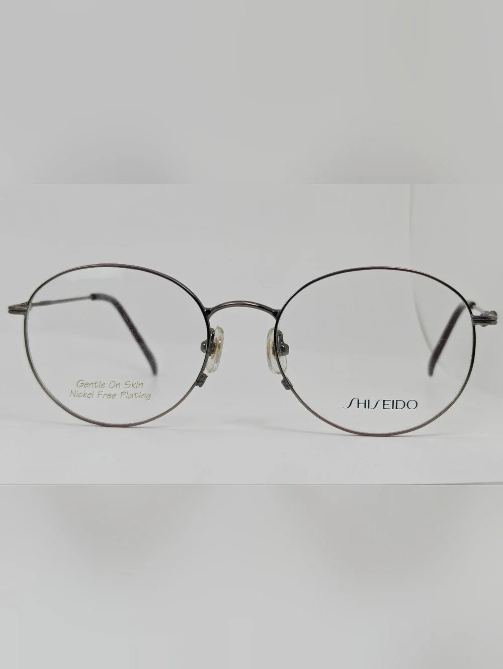 Shiseido 705.  Women's  Round Metal Glasses in Purple Gunmetal. Systech.
